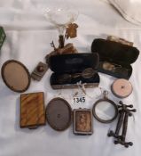 A tray of vintage items, including vesta, magnifying glass, spelter deer, spill vase etc.