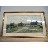 A gilt framed countryside scene watercolour signed George Oyston