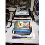 A quantity of books relating to cats,