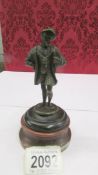 A bronze figure of a nobleman, possibly an explorer or astronomer, 19th century.