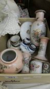 A box of miscellaneous ceramics including vases, candlesticks, cruet etc.