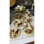 Approximately 18 pieces of Aynsley Orchard Gold china including 6 cups & saucers, 4 tea plates,