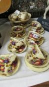 Approximately 18 pieces of Aynsley Orchard Gold china including 6 cups & saucers, 4 tea plates,