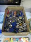 A large quantity of collectors spoons etc.