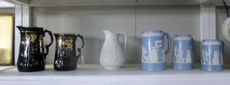 6 various jugs including one stamped J.