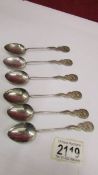 A set of 6 Hong Kong silver teaspoons with dragon handles.