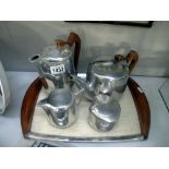 A Picquot ware 4 piece tea and coffee pot set on tray