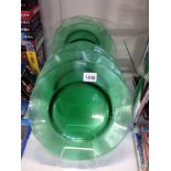 8 large green art glass plates