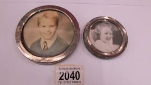 Two silver photograph frames (no stands).