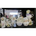 A shelf of assorted ceramics including jugs, dishes etc.