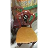 Two Victorian mahogany chairs.