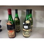 3 bottles of Cuvee Speciale white burgundy and a 1969 Calvet Reserve De Bastion