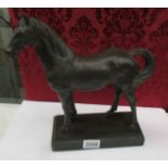 A horse figure on base.