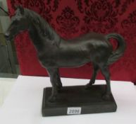 A horse figure on base.