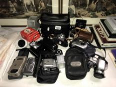 A quantity of various cameras etc.