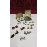 Approximately 10 pairs of cuff links including silver 'Rex', Enamelled farthings,