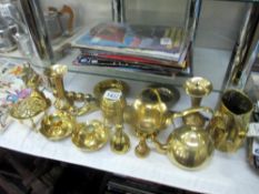 A quantity of misc.brass items including candlestick holders, bells etc.