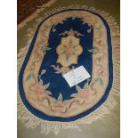 A 165 x 110 cm rug.