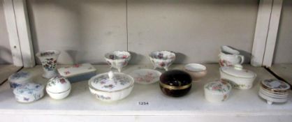 A selection of porcelain trinket boxes including Wedgwood