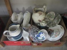 2 boxes of mixed vintage china including cake stands, jugs, plates etc.