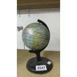A small vintage globe.