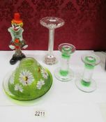 A pair of glass candlesticks, one other, a hand painted tea light and a glass clown.