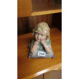 A 'Reverie' small cast plaster head of a child (Art nouveau).