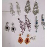 6 pairs of sparkly pendant earrings.