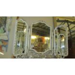 A triple dressing table mirror.