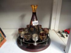 A gilded glass drinks set on tray,