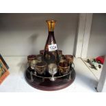 A gilded glass drinks set on tray,