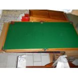 A table top snooker board.