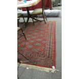 A red patterned rug.