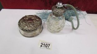 A silver trinket box and a cut glass atomiser (top unmarked).