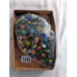 A quantity of vintage marbles 100+