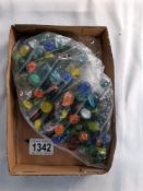 A quantity of vintage marbles 100+