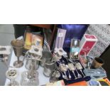 A mixed lot of silver plate including candelabra, goblets etc.