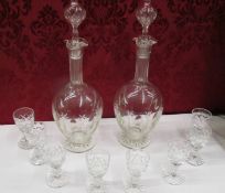 A good pair of cut glass decanter with 8 glasses.