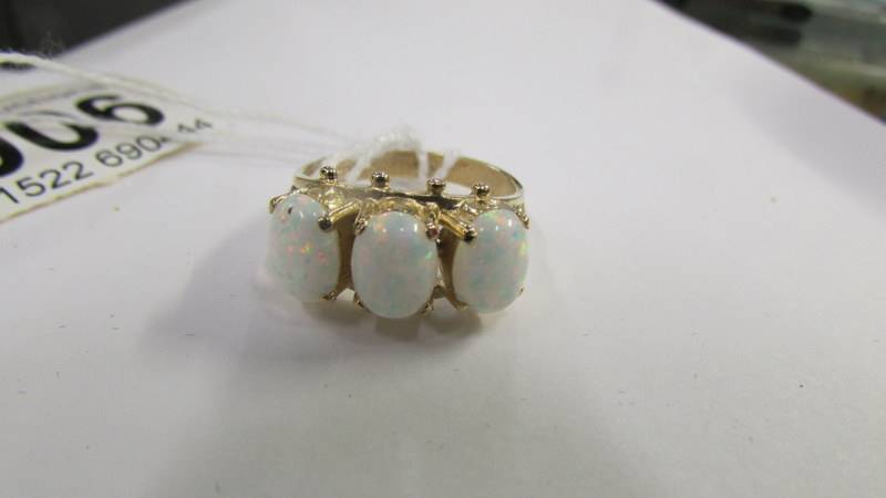 A9ct yellow gold 3 stone opal ring, size O. - Image 2 of 2