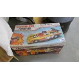 A boxed radio controlled Renault Alpine.