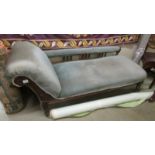 A Victorian mahogany chaise longue.