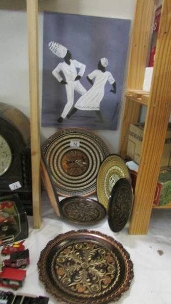 A mixed lot of ethnic style metal plates etc.