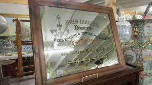 An advertising mirror for John Rogers, Pewterers.