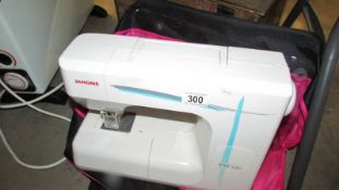 A Janone electric sewing machine.