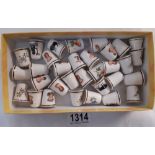 A box of decorative bone china thimbles