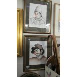 A pair of framed and glazed Sad Clown prints.