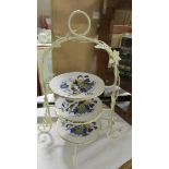 A wrought iron cake stand.
