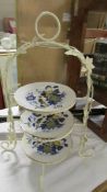 A wrought iron cake stand.