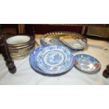 A mixed lot of plates and dishes.