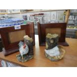 A pair of mahogany photograph frame bookends and a pair of resin chicken bookends